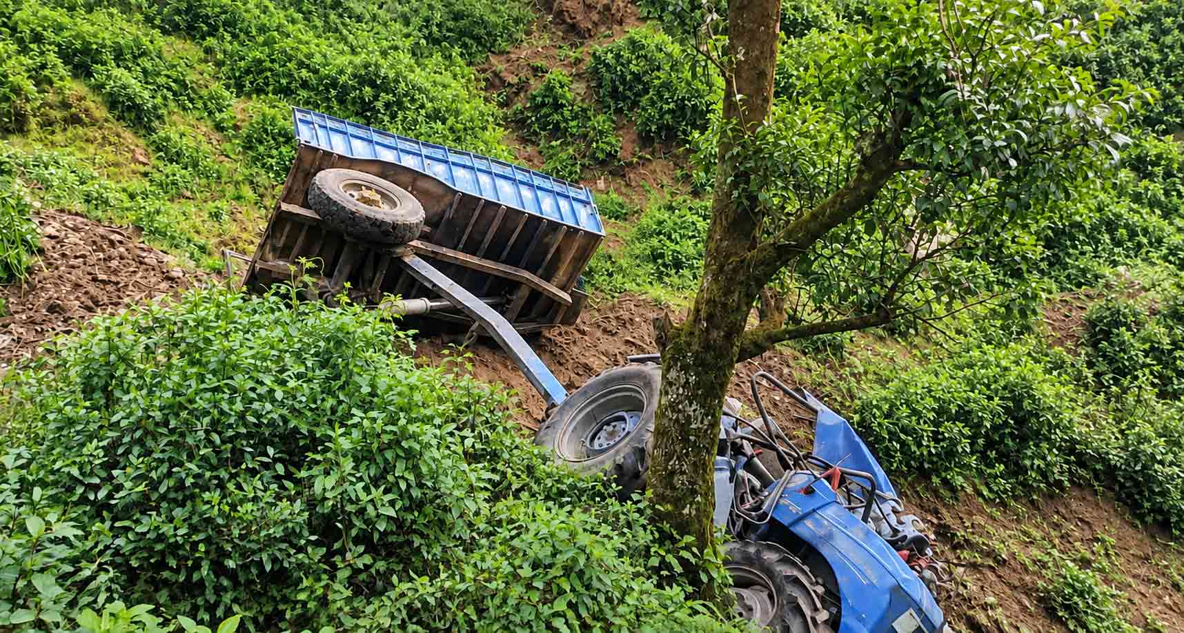 Tractor carrying workers falls off highway in Doti, injuring nine